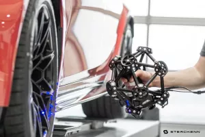 Ręczny skaner Creaform MetraSCAN 3D skanuje karoserię samochodu – pomiar optyczny 3D
